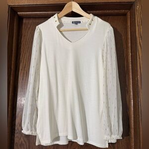 Beautiful beige, soft blouse can be tucked in or worn out